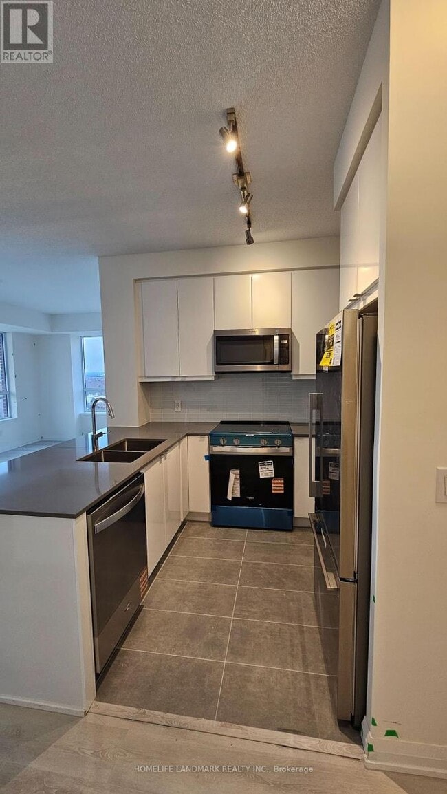 Photo du bâtiment - 3260 Sheppard Ave E