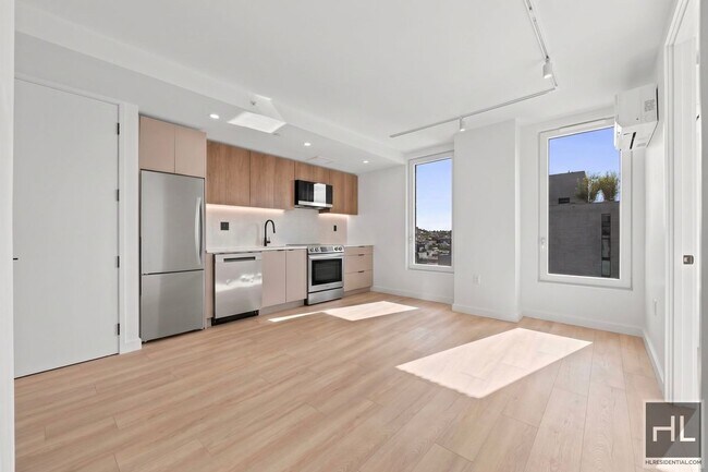 Building Photo - Free Month on 18 month - Lease New Development
