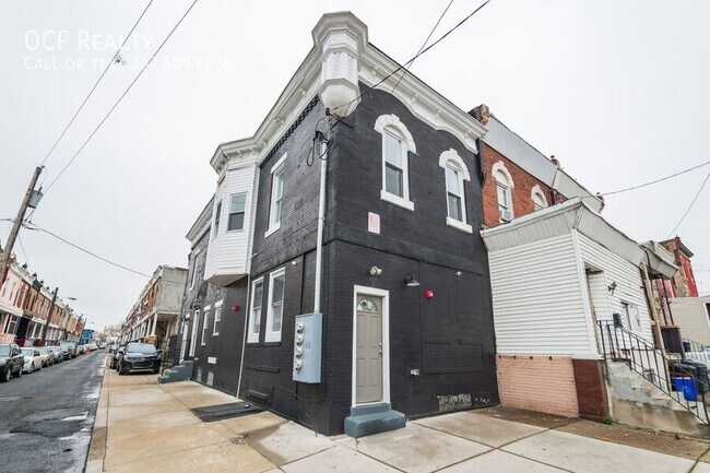 Foto del edificio - 5715 Woodland Ave