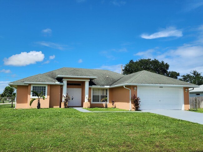 Building Photo - 4 BR 2 BA 2 CG rental in western PSL