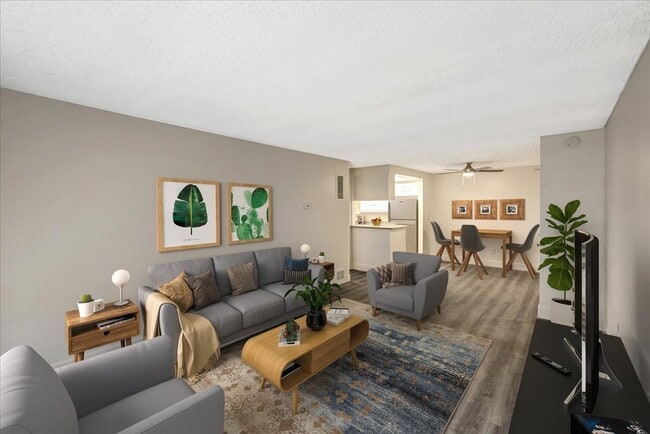 Una habitación Sala de estar con muebles - El Dorado Apartments