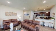 Located at 3227 S Babcock St in Melbourne, Florida, this single-story home offers a well-planned layout with 2 bedrooms, 3 bathrooms, and two dedicated office spaces, making it an excellent choice for remote work or multi-use living. The open-concept kitchen is a standout feature, boasting rich dark cabinetry, granite countertops, stainless steel appliances, pendant lighting, and a breakfast bar with seating — ideal for both casual meals and entertaining. The living room is bright and welcoming, with multiple windows allowing ample natural light, recessed lighting, and wood-look flooring that flows seamlessly throughout the home. The two office spaces are well-lit by natural light from multiple windows and include ceiling fans, offering comfortable and productive work environments. The bedrooms are cozy and restful, with ceiling fans and natural light from exterior-facing windows. All three bathrooms are finished with tile flooring, dark vanity cabinetry, granite countertops, and tub-shower combinations. The home also includes hallways with ample storage space. A fenced backyard with mature trees provides privacy and a pleasant outdoor retreat. This home balances functional versatility with comfortable living in a convenient Melbourne location.