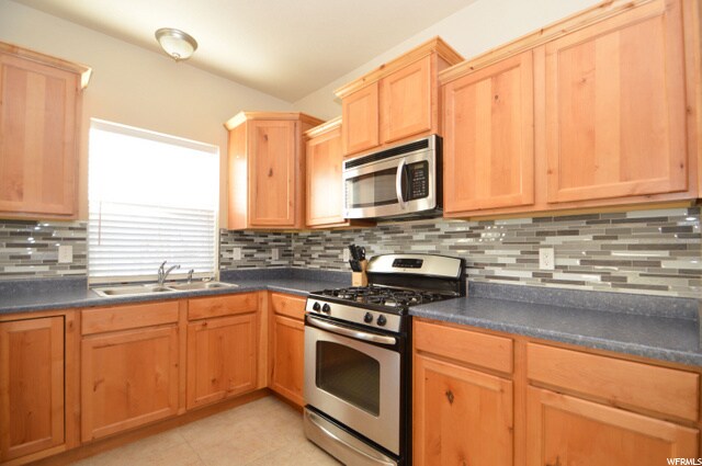 Gas Range and built-in microwave - 1048 N Shepard Creek Pky