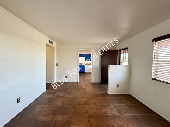 Building Photo - 7650 N Rasmussen Ave