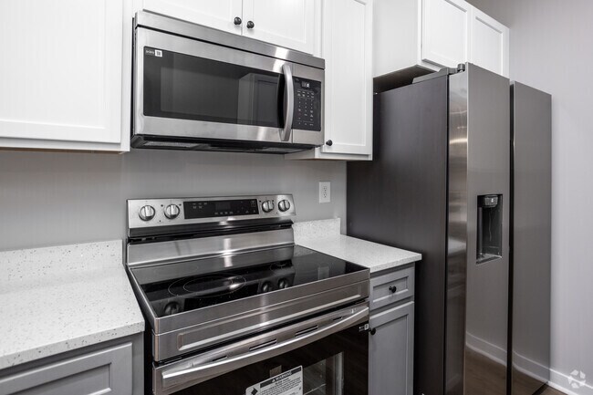 3 habitaciones, 2 baños, 1044 pies cuadrados, cocina - Woodford Ridge Townhomes