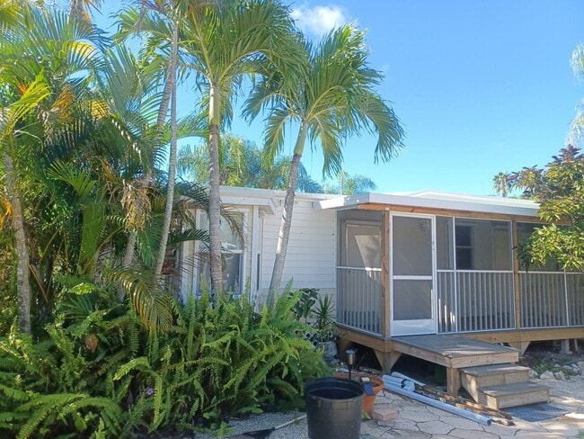 Building Photo - COMING EARLY JUNE: ISLAND LIVING IN BOKEELIA: 1 BD / 1.5 BR Front Screened Lanai