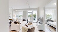 Located at 299 The Kingsway in Toronto's Etobicoke neighbourhood, Suite 607 is a well-appointed one-bedroom, one-bathroom residence designed with a clean, contemporary aesthetic throughout. The open-concept living, dining, and kitchen area forms the heart of the unit, finished with light hardwood flooring and crisp white walls that amplify the abundant natural light streaming in through large floor-to-ceiling windows. Track lighting overhead adds a modern touch and allows for flexible illumination across the space. The kitchen is outfitted with sleek white cabinetry, stainless steel appliances including a full-size refrigerator and range, and a microwave — efficiently integrated to maximize the open layout. The dining area comfortably accommodates a full table and chairs, positioned alongside the windows to take advantage of the green treetop views beyond. The bedroom is a serene retreat, featuring a generous window with outdoor views, warm hardwood floors, and ample room for a full bedroom suite. The bathroom is finished to a high standard, showcasing large-format marble-look porcelain tile on both the floors and walls, a modern vanity with under-mount sink, and a glass-enclosed walk-in shower. A hallway connects the spaces with functional flow, completing this thoughtfully designed urban residence.