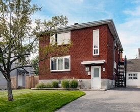 Building Photo - 410 Tweedsmuir Av