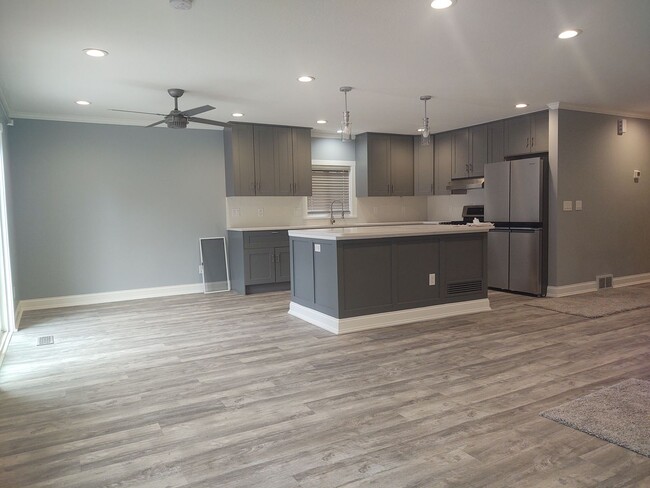 Building Photo - Like NEW; completely remodeled rambler sty...