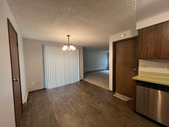 Building Photo - New Paint & Flooring! (Water & Garbage Included)