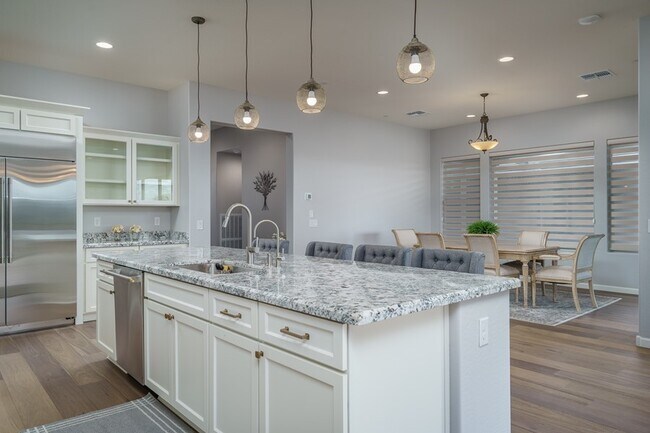 Foto del edificio - GORGEOUS HOME IN THE DESIRABLE TRILOGY AT ...