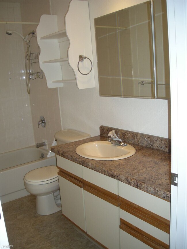 Foto del edificio - 2 br, 1 bath 4plex - 712 W 47th Ave Apt 3 #3