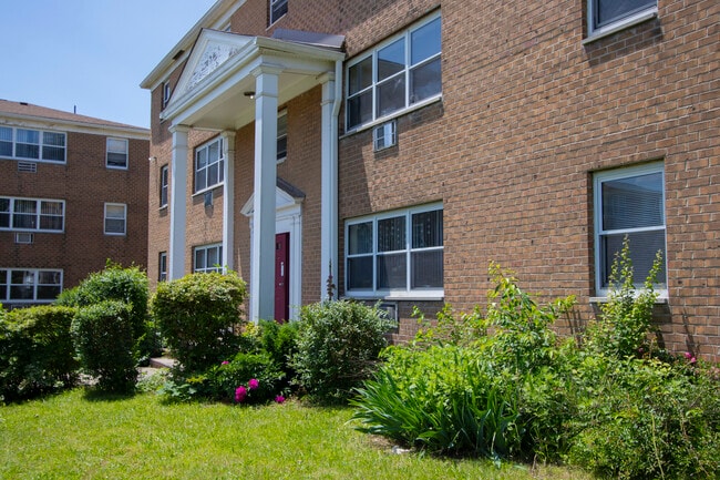 Beautiful Landscaping Surrounds the Entrance Areas - High Park Terrace