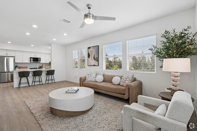 3BR, 2BA - 1,346SF - Living Room - Canyon Bluffs Apartments
