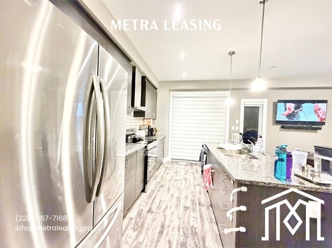 Building Photo - Three + Den House in London