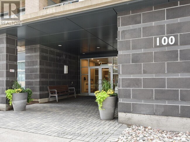 Building Photo - 100 Champagne Ave S
