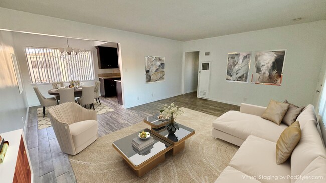 living room (Digitally Staged) - 444 W Regent St Apartments