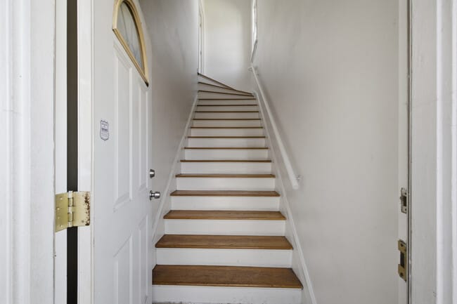 Staircase to upstairs apartment - 1097 S Orange Dr