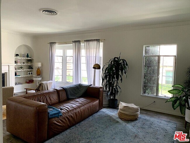 Living Room - Beautiful Natural Light - 212 S Rexford Dr