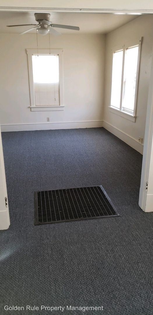 Building Photo - 1 br, 1 bath Apartment - 213 E 1st