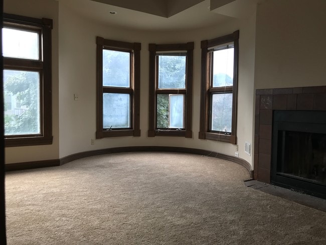 Living room and turret - 2597 N Murray Ave