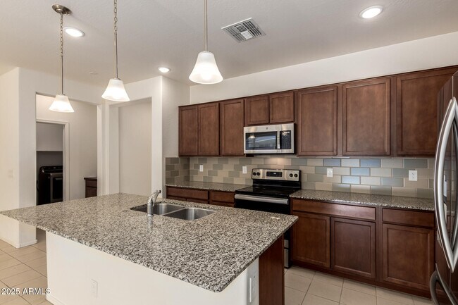 Building Photo - 7046 N 84th Dr