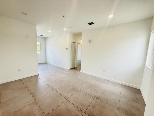 Building Photo - 1295 W 69th St