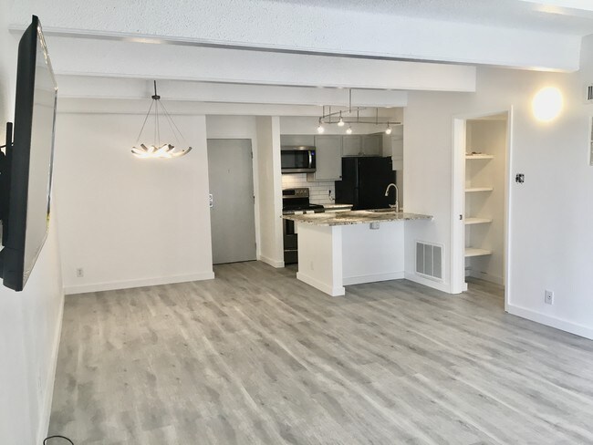 View from patio into living/dining/kitchen - 777 N Washington St