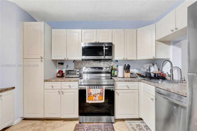 Building Photo - 3050 NW 42nd Ave