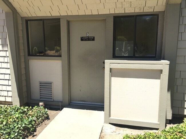 Laundry room few steps from the house - 1443 Marchbanks Dr