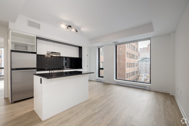 2 BR, 1 BA - 785SF - Living And Dining Room - Gramercy Residences