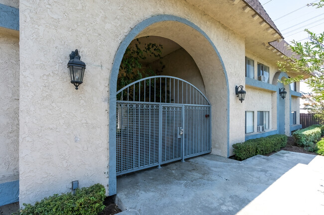 Gated entrance. - Beachside Apartments