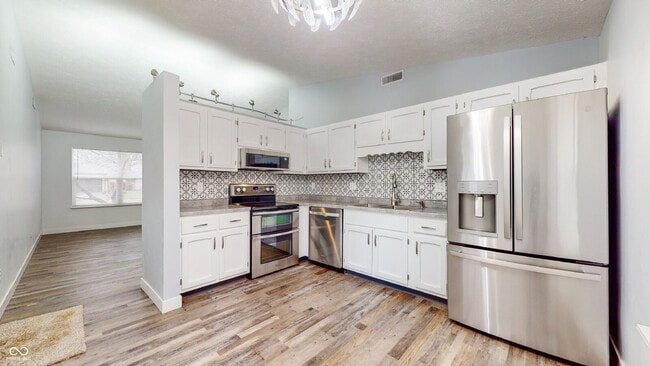 Photo - "Charming 3-Bedroom Gem in Indianapolis with Cozy 984 Sq. Ft. Living Space!" Apartment