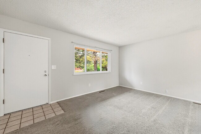 Building Photo - $1,945.95- 3-bed/1.5-bathroom home in Colorado Springs with a spacious fenced-in yard!