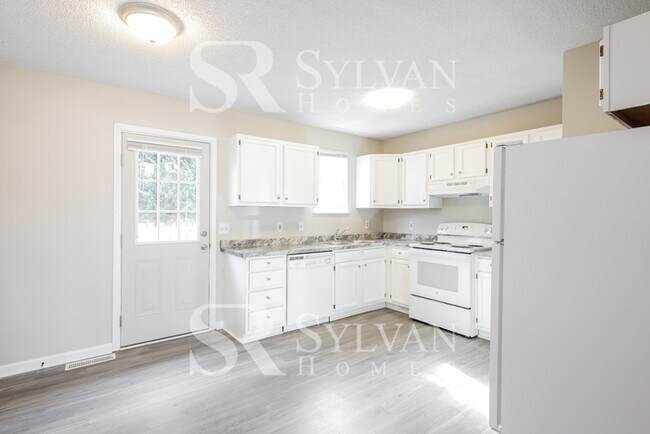 Building Photo - Embrace Tranquility and Convenience