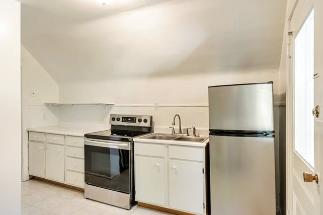 Kitchen. New stove and faucet. - 1058 S 900 E