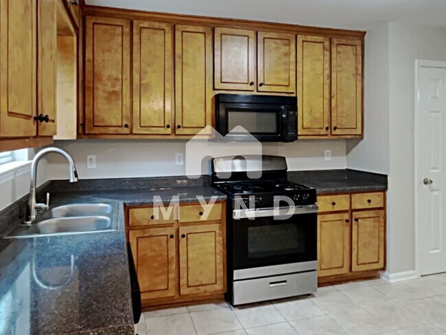 Building Photo - 5840 Colonnade Dr