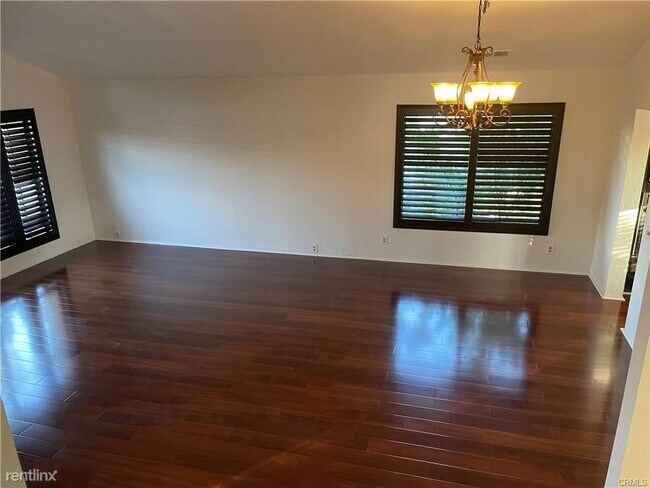 Building Photo - 4 br, 3 bath House - 22263 Roundup Dr