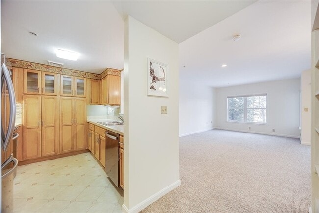 Building Photo - Updated 2BR Condo with Balcony, Garage Parking & Resort-Style Amenities