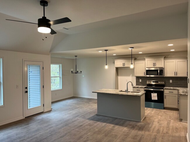 Building Photo - BRAND-NEW 3-bedroom, 2-bath home with Spri...