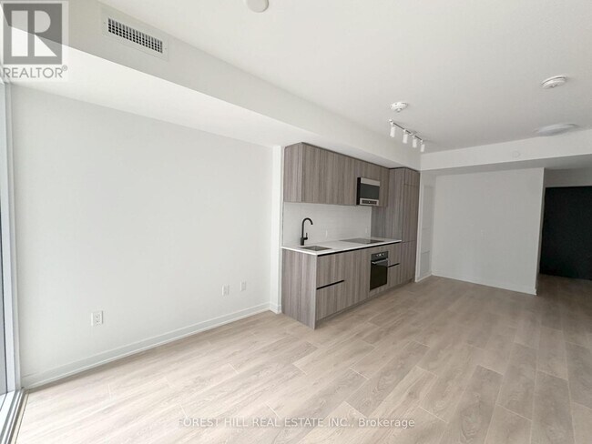 Photo du bâtiment - 117-117 Broadway Ave