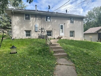 Building Photo - "Charming 2-Bed Hideaway in NE Minneapolis - Spacious 900 Sq. Ft. Comfort!"