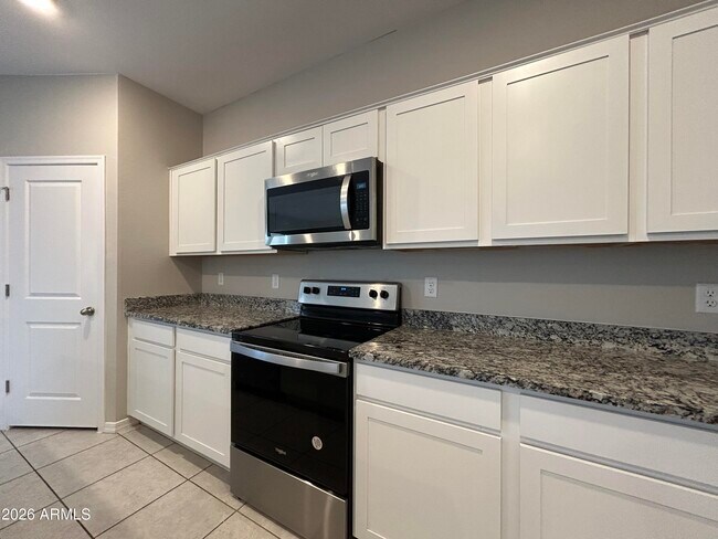 Building Photo - 6551 W Magdalena Ln