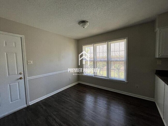 Building Photo - 8398 Wind River Cir N