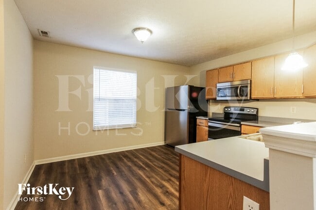Building Photo - 9223 Timpani Way