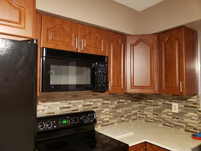 Stove top microwave oven - 433 SE 5th St