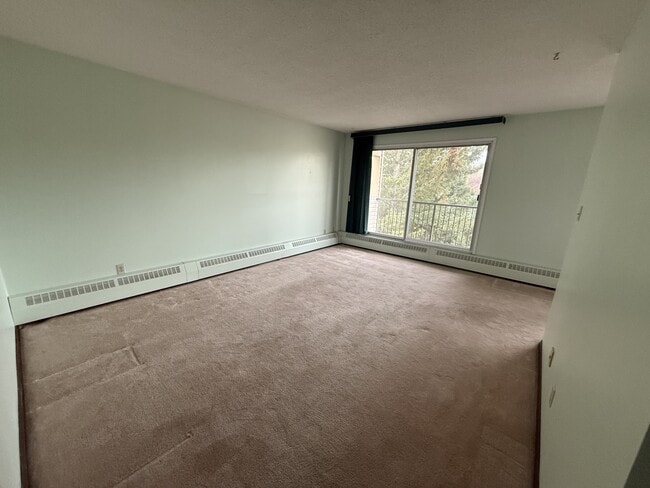 Photo du bâtiment - 301-911-310 10 St