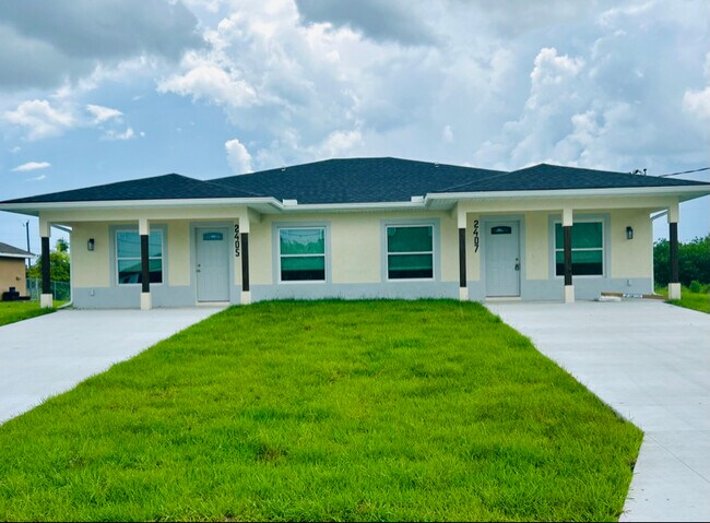 Building Photo - 2409-2411 Churchill Ave N