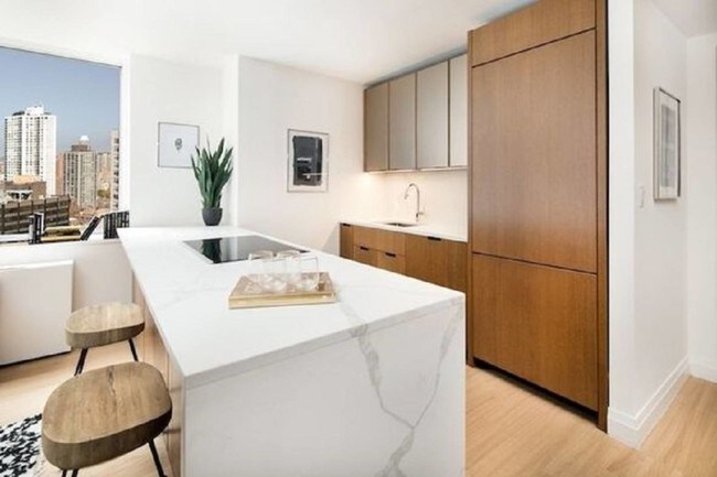 Foto del edificio - 419-420 E 54th St