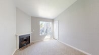 Located at 7434 Auburn Oaks Ct in Citrus Heights, CA, this efficiently designed one-bedroom, one-bathroom home offers a thoughtful layout across a single floor. The living room serves as the centerpiece of the space, highlighted by vaulted ceilings that enhance the sense of openness, a classic fireplace with a white mantle, neutral carpet flooring, and a large window fitted with vertical blinds that invites an abundance of natural light. The combined kitchen and dining area is well-appointed, featuring white cabinetry with modern hardware, granite-style countertops, a double-basin stainless steel sink, and a full suite of stainless steel appliances including a refrigerator, range, microwave, and dishwasher. Wood-look flooring runs throughout the kitchen, adding warmth and contrast. The bedroom offers comfortable carpeting, neutral wall tones, and a window with an outdoor view, creating a calm and restful retreat. A dedicated closet provides practical storage. The bathroom is clean and functional, complete with a tub/shower combo, a vanity with dark countertops, and wood-look flooring. In-unit laundry adds everyday convenience to this well-maintained Citrus Heights home.